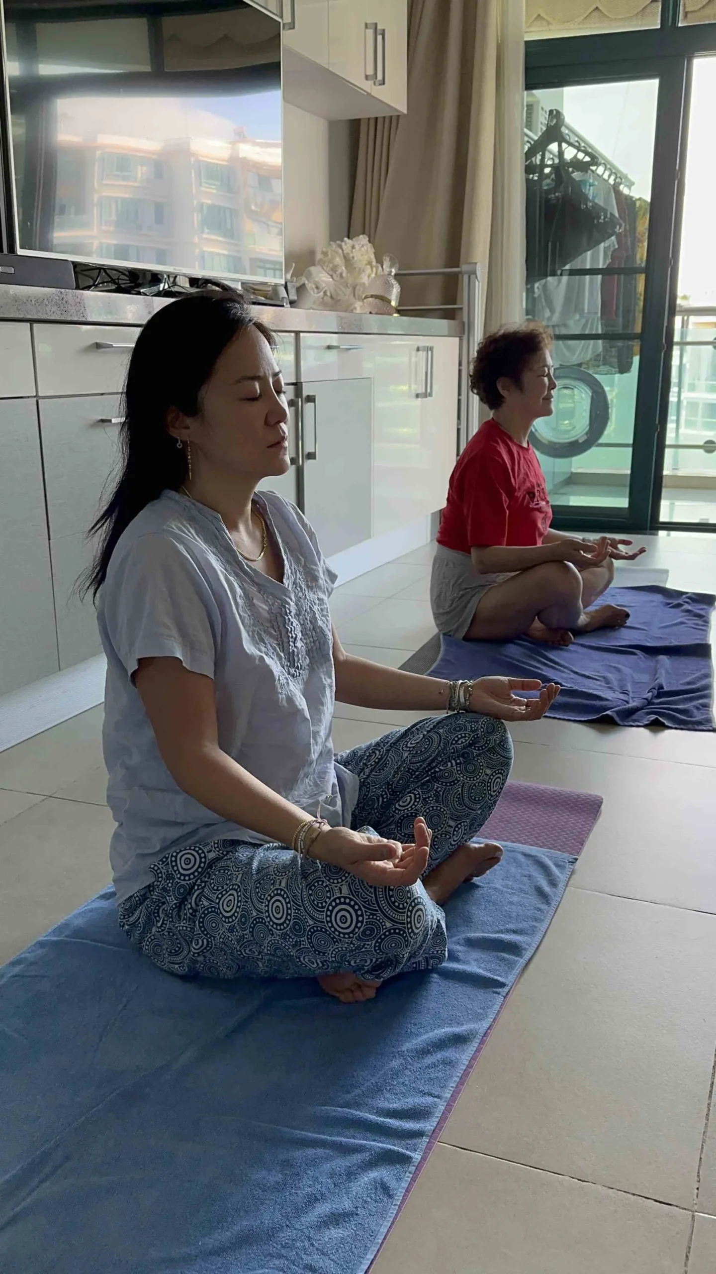 Here's a photo of me and my mother meditating this morning to a YouTube video. Sitting still in full presence is something I am trying to be better at. But I am slowly making progress day by day.